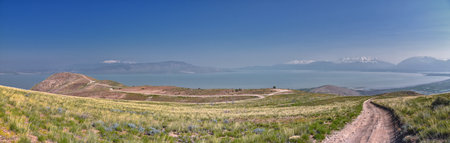 Utah Lake from West Lake Mountain Peak hiking trail views by Radio Towers and Observatory, Wasatch Front Rocky Mountains, Provo, Utah.の写真素材