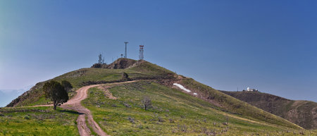 Radio Tower Observatory on West Lake Mountain Peak spring mountain hiking trail, Utah Lake, Wasatch Front Rocky Mountains, Provo, Utah. USA.の写真素材