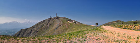 Radio Tower Observatory on West Lake Mountain Peak spring mountain hiking trail, Utah Lake, Wasatch Front Rocky Mountains, Provo, Utah. USA.の写真素材