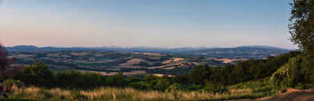 Italy rural Landscape from San Venanzo comune in the Province of Terni  Umbria region rolling hills. Evening sunset, green farm fields. 2023の写真素材