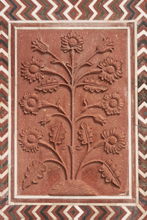 Detail of decoration on the mosque at the Taj Mahal. Mughal style building of red sandstone inlaid with marble. Agra, Uttar Pradesh, Indiaの写真素材