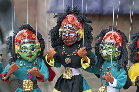 Stock Photo: Colorful puppets on a market stall in Kathmandu, Nepalの写真素材