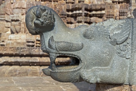 Granite water spout in the shape of a mythical creature at the ancient Ayadevi Temple within the grounds of the Konark Temple Complex, Orissa, India. 13th Century ADの写真素材