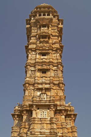 Ornate carved stone tower built to celebrate an ancient victory. Chittaugarh Rajasthan India.の写真素材