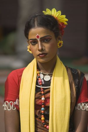 Haryana, India - February 12, 2009: Indian dancer in traditional tribal outfit at the Sarujkund Craft Fair in Haryana near Delhi, India.のeditorial素材