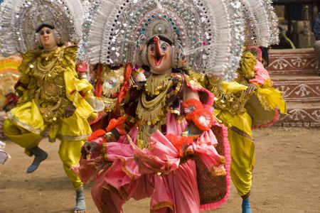 Haryana, India - February 3, 2008: Group of Indian dancers in elaborate costumes and masksのeditorial素材