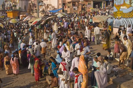 Varanasi, Uttar Pradesh, India - October 11, 2007: Crowds of people bathing in the sacred River Ganges in the sacred city of Varanasi, Uttar Pradesh, Indiaのeditorial素材