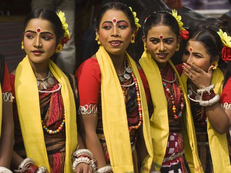Haryana, India - February 12, 2009: Group of teenage Indian dancers in traditional tribal outfit at the Sarujkund Craft Fair in Haryana near Delhi, India.のeditorial素材