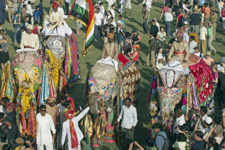 Jaipur, India - March 21, 2008: Group of decorated elephants amongst a crowd of people at the annual...