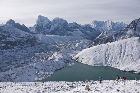 Himalaya Mountains, Nepal - May 20, 2010: People climbing the snow covered mountain side above Gokyo in the Himalaya Mountains of Nepalのeditorial素材