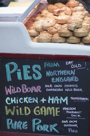 London, England - December 31, 2009: A stall selling a variety of traditional pies at Borough Market in Southwark, London, England.のeditorial素材