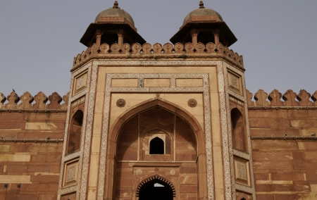 Fatehpur Sikri, India - April 7, 2009: Imposing red brick entrance to the ancient Friday Mosque at Fetehpur Sikri in Uttar Pradesh, India. 16th Century AD.のeditorial素材