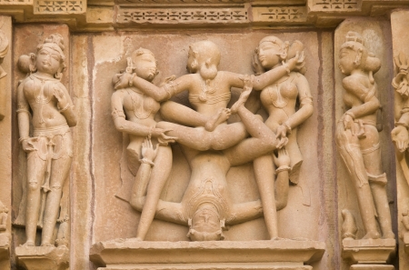 Khajuraho, India - January 13, 2009: Erotic sculptures decorating the ancient Kandariya Mahadeva Hindu Temple at Khajuraho, Uttar Pradesh, India. 11th Century AD.のeditorial素材
