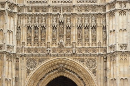 Detail of the stonework of the Victoria Tower above the Sovereigns Entrance to the Houses of Parliament in London, Englandの写真素材