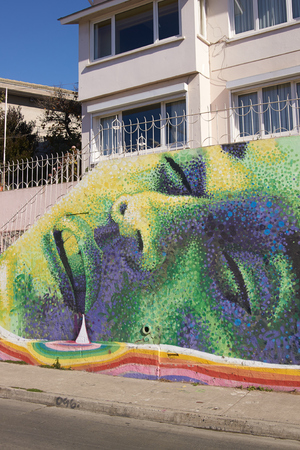 Valparaiso, Chile - May 16, 2014  Colourful graffiti decorating a street in the world heritage city of Valparaiso in Chileのeditorial素材