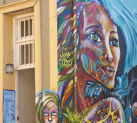 Valparaiso, Chile - May 16, 2014  Colourful graffiti decorating a building in the world heritage city of Valparaiso in Chileのeditorial素材