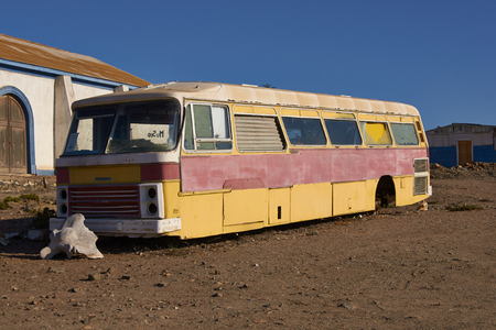 Abandoned bus in the small fishing village of Carrizal Bajo off the coast of the Atacama Desert in Chileのeditorial素材