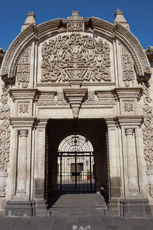 Ornate carved stonework at the entrance to the 18th century baroque style Spanish colonial house Casa Tristan del Pozo in Arequipa, Peruの写真素材