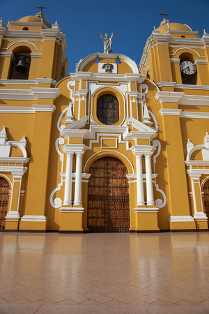 Bright yellow colonial style Cathedral in the Plaza de Armas of Trujillo, Peruの写真素材