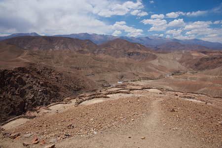 Archeological site with remains of the historic fortress of Pukara de Copaquilla in the Andes Mountains of northern Chile.のeditorial素材