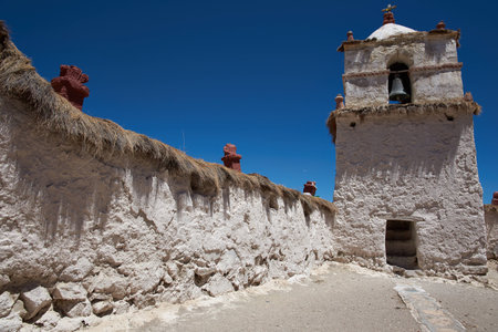 Historic 17th century church in the small village of Parinacota, located at an elevation of 4,400 metres in Lauca National Park and on the altiplano of northern Chile.の写真素材