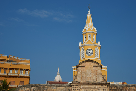 Historic Clock Tower (Torre del Reloj) above the main gateway into the historic walled city of Cartagena de Indias in Colombiaの写真素材