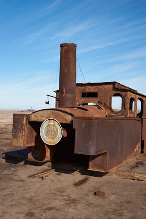 Humberstone, Chile - July 1, 2015: Derelict and rusting steam train at the historic Humberstone Saltpeter Works in the Atacama Desert near Iquique in Chile. The site is now an open air museum and a Unesco World Heritage SIte.のeditorial素材