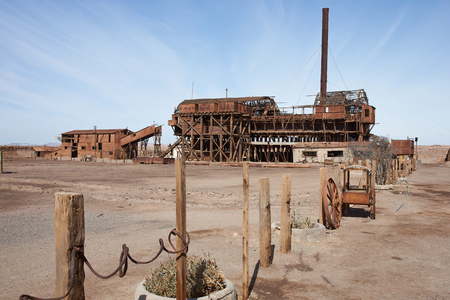 Santa Laura, Chile - July 1, 2015: Derelict and rusting leaching plant at the historic Santa Laura Saltpeter Works in the Atacama Desert near Iquique in Chile. The site is now an open air museum and a Unesco World Heritage SIte.のeditorial素材