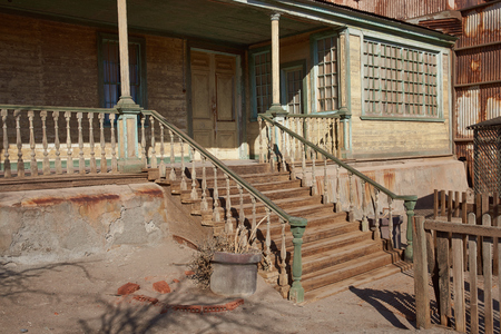 Humberstone, Chile - July 1, 2015: Derelict and rusting administrative buildings at the historic Humberstone Saltpeter Works in the Atacama Desert near Iquique in Chile. The site is now an open air museum and a Unesco World Heritage SIte.のeditorial素材