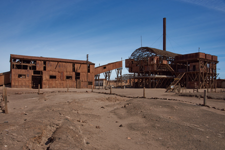 Santa Laura, Chile - July 1, 2015: Derelict and rusting leaching plant at the historic Santa Laura Saltpeter Works in the Atacama Desert near Iquique in Chile. The site is now an open air museum and a Unesco World Heritage SIte.のeditorial素材