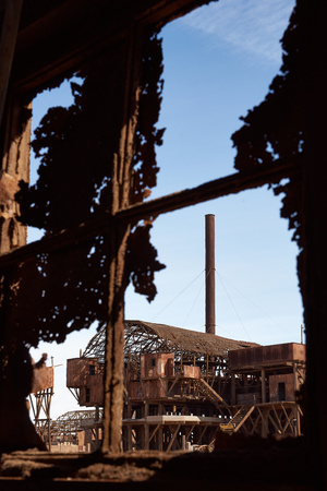 Santa Laura, Chile - July 1, 2015: Derelict and rusting leaching plant at the historic Santa Laura Saltpeter Works in the Atacama Desert near Iquique in Chile. The site is now an open air museum and a Unesco World Heritage SIte.のeditorial素材