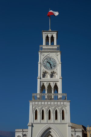 Historic clock tower in Plaza Arturo Prat in the old quarter of Iquique on the Pacific coast of northern Chile. Built circa 1877.のeditorial素材