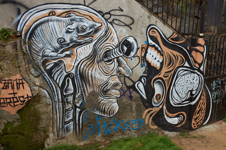 Valparaiso, Chile - September 4, 2015: Colourful street art decorating houses in the port city of Valparaiso in Chile.のeditorial素材