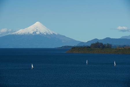 Snow capped Volcano Osorno 2,652 metres on the edge of Llanquihue Lake in Southern Chile. Viewed from Puerto Varas.のeditorial素材