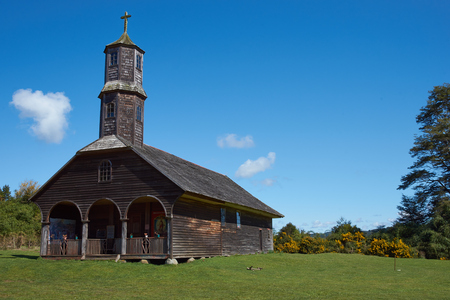 Historic wooden church, Iglesia de Colo, built in the 17th century by Jesuit missionaries on the island of Chiloe in Chile.の写真素材