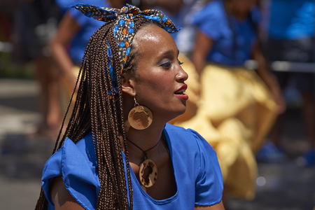 ARICA, CHILE - JANUARY 23, 2016: Dancer from a group of dancers of Africa descent Afrodescendiente performing at the annual Carnaval Andino con la Fuerza del Sol in Arica, Chile.のeditorial素材