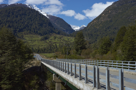 Bridge crossing the Rio Frio on the Carretera Austral road in the Aysen Region of southern Chile.の写真素材