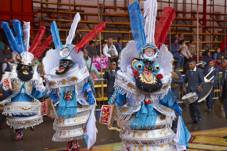 ORURO, BOLIVIA - FEBRUARY 25, 2017: Morenada dancers in ornate costumes parade through the mining city of Oruro on the Altiplano of Bolivia during the annual carnival.のeditorial素材
