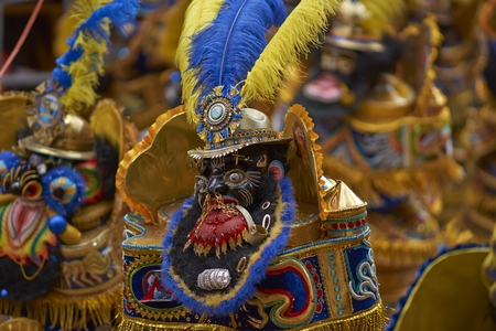 ORURO, BOLIVIA - FEBRUARY 25, 2017: Morenada dancers in ornate costumes parade through the mining city of Oruro on the Altiplano of Bolivia during the annual carnival.のeditorial素材