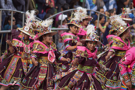 ORURO, BOLIVIA - FEBRUARY 25, 2017: Tinkus dancers in colourful costumes performing at the annual Oruro Carnival. The event is designated by UNESCO as being Intangible Cultural Heritage of Humanity.のeditorial素材