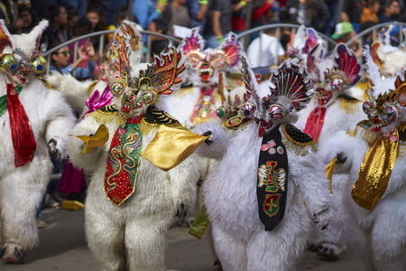 ORURO, BOLIVIA - FEBRUARY 25, 2017: Diablada dancers in ornate bear costumes parading through the mining city of Oruro on the Altiplano of Bolivia during the annual carnival.のeditorial素材