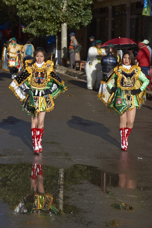 ORURO, BOLIVIA - FEBRUARY 26, 2017: Diablada dancers in ornate costumes parade through the mining city of Oruro on the Altiplano of Bolivia during the annual carnival.のeditorial素材