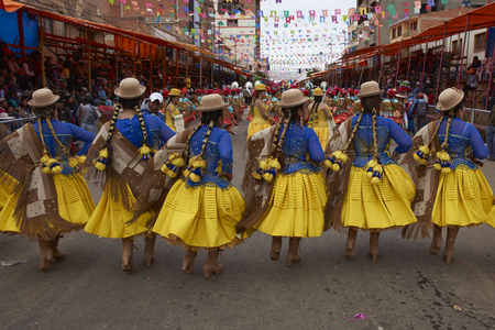ORURO, BOLIVIA - FEBRUARY 26, 2017: Morenada dance group in colourful outfits parading through the mining city of Oruro on the Altiplano of Bolivia during the annual Oruro Carnival.のeditorial素材