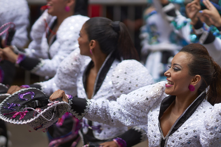 ORURO, BOLIVIA - FEBRUARY 26, 2017: Caporales dancers in ornate costumes performing as they parade through the mining city of Oruro on the Altiplano of Bolivia during the annual carnival.のeditorial素材
