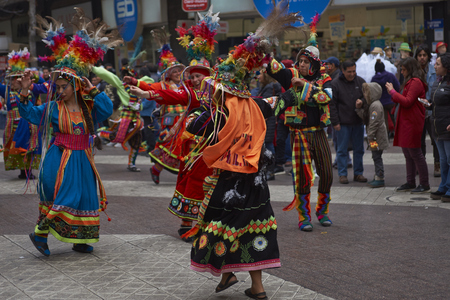 Santiago, Chile - August 5, 2017: Tinkus dance group parading through the centre of Santiago, Chile to mark Independence Day of Bolivia.のeditorial素材