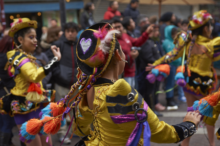 Santiago, Chile - August 5, 2017: Caporales dance group parading through the centre of Santiago, Chile to mark Independence Day of Bolivia.のeditorial素材