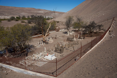 Tiliviche, Tarapaca Region, Chile - August 21, 2017: Historic British Cemetery from the era of nitrate mining in the Atacama Desert, in the grounds of Hacienda Tiliviche in northern Chile.のeditorial素材