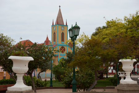Taltal, Antofagasta Region, Chile - September 2, 2017: Colourful church in the main square of Taltal on the coast of northern Chile.のeditorial素材
