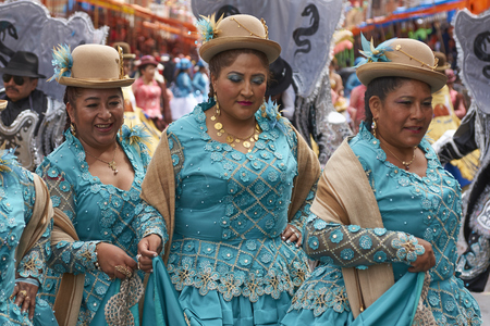 ORURO, BOLIVIA - FEBRUARY 26, 2017: Morenada dance group in colourful outfits parading through the mining city of Oruro on the Altiplano of Bolivia during the annual Oruro Carnival.のeditorial素材