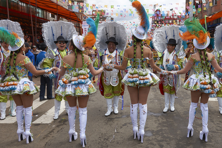 ORURO, BOLIVIA - FEBRUARY 26, 2017: Morenada dance group in colourful outfits parading through the mining city of Oruro on the Altiplano of Bolivia during the annual Oruro Carnival.のeditorial素材